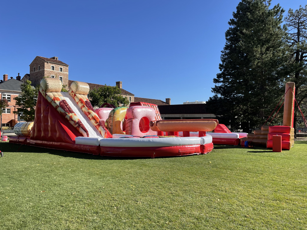Blow up obstacle course on campus field.